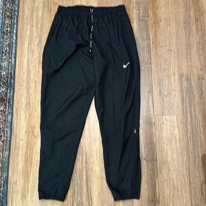Nike ladies wind pants sz Medium